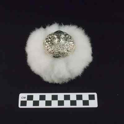 Lady's white powder puff