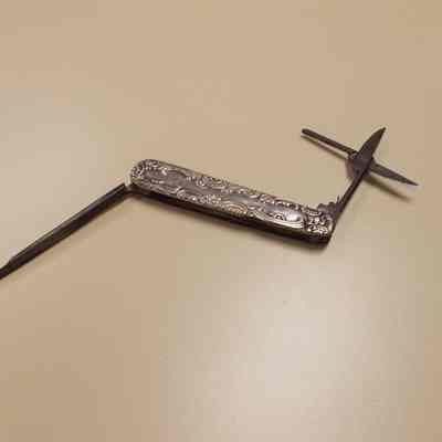 Sterling silver handled scissors, file, knife combination