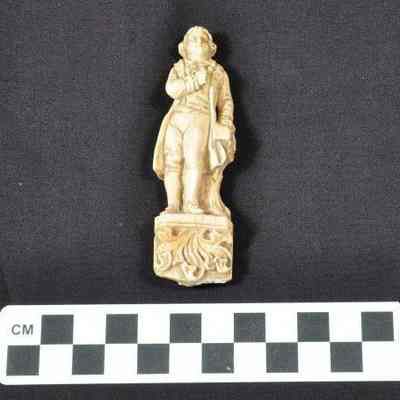 One carved ivory figurine depicting a young Thomas Jefferson