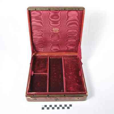 Square, brown-burgundy colored jewelry box -inside