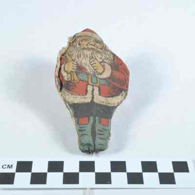 Small fabric Santa Claus doll
