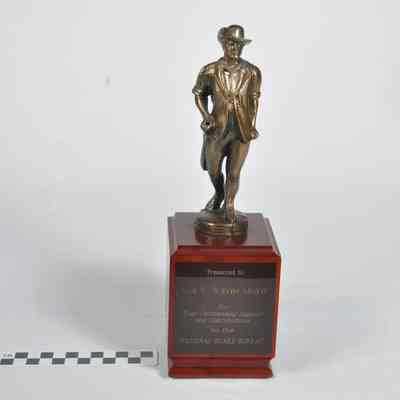 A small statue of a minuteman holding a musket