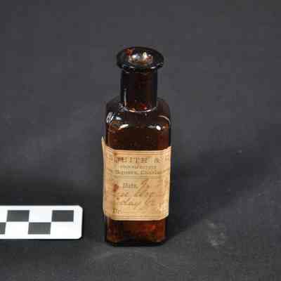 Dark brown rectangular pharmacy bottle