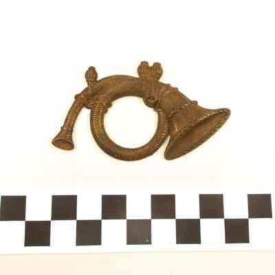 Dull brass U.S. infantry hat insignia