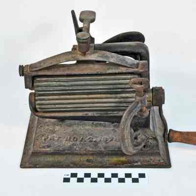 Fabric crimper with removable brass rollers