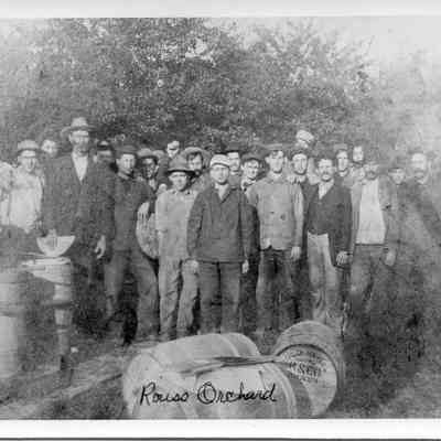 Workers standing outside at Rouss Orchard