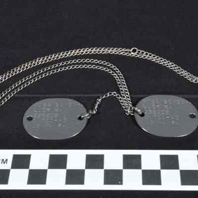 Lucy Rosenberger Milton's aluminum ID tags