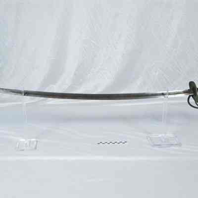 Sword of tempered steel blade, brass pommel and guard