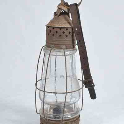 Tin and glass lantern