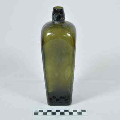 Dark green glass camphor bottle