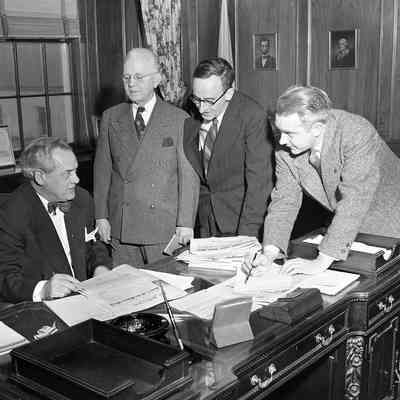 R. J. Funkhouser and editors Ed. Blake, Caskie Norvall, and Col. Compton