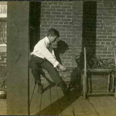 Brackett House, front porch with unidentified boy