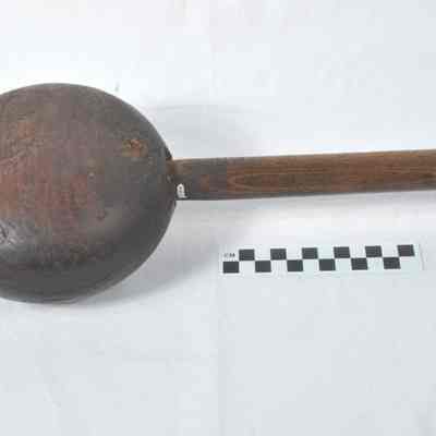 Heavy disk shaped wooden mallet