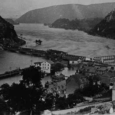 Flood showing only remaining span of the bridge