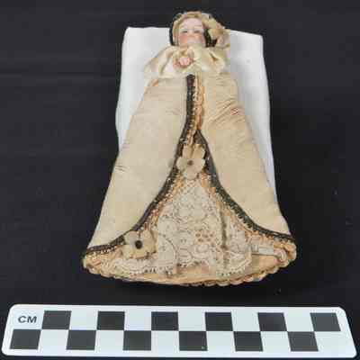 Small, German bisque-head doll