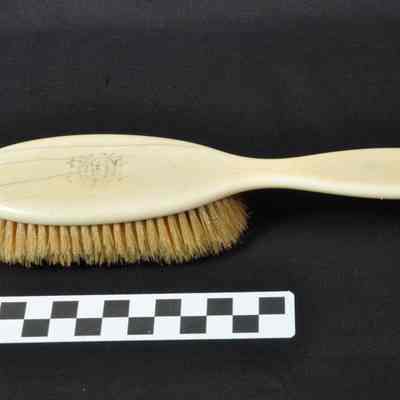 Ivory hair brush with off white bristles