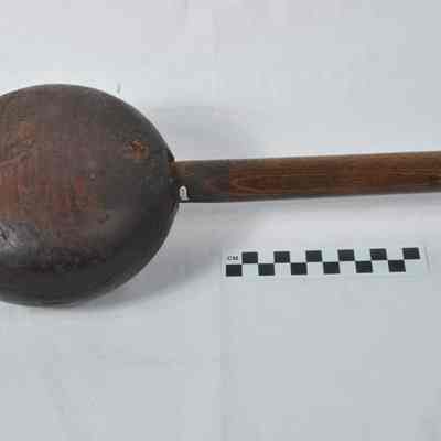 Heavy disk shaped wooden mallet
