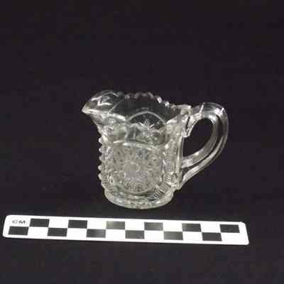 Clear glass pitcher made for child's play