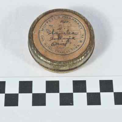 Moffetts Pharmacy round tin