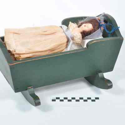 Doll and cradle