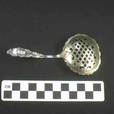 Silver gilt pierced serving spoon