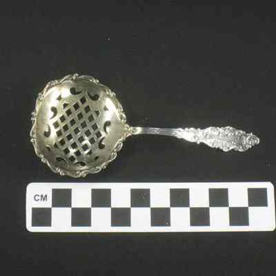 Silver gilt pierced serving spoon