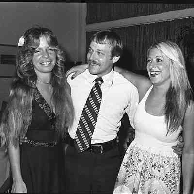 Unidentified man & 2 women