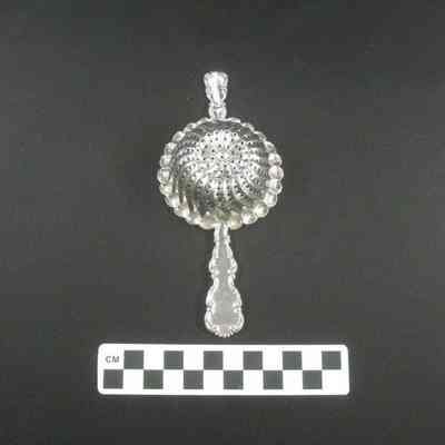 Silver tea strainer