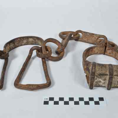 Wrought iron ankle shackle with beam attachment