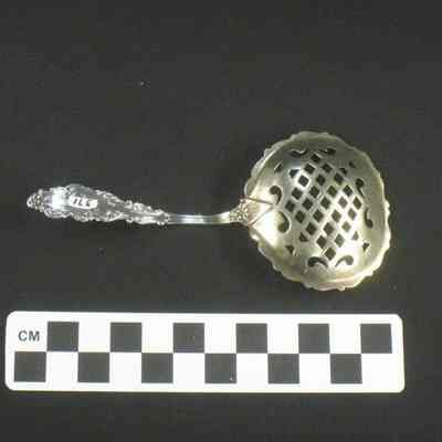 Silver gilt pierced serving spoon