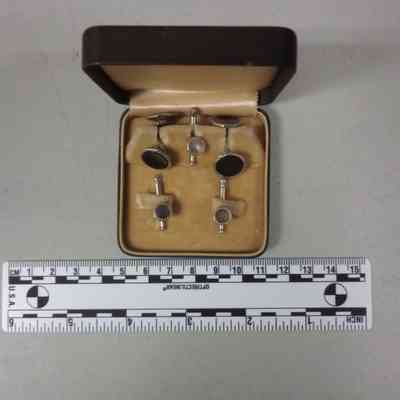 Box of cuff links and pins