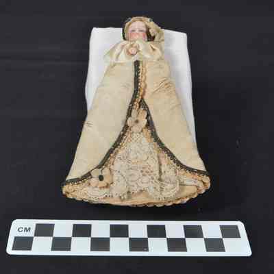 Small, German bisque-head doll