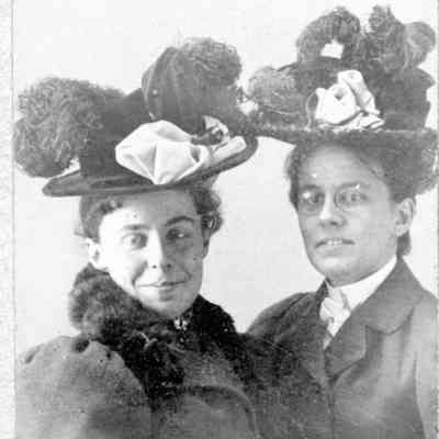 Two young women in elaborate hats, c. 1907
