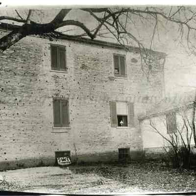 Wall of "Locust Hill" showing bullet holes