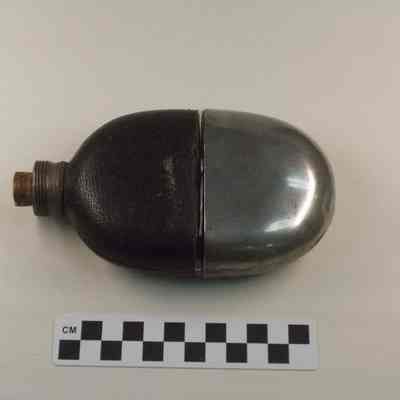 Glass flask with leather cover