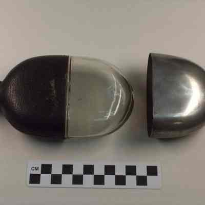 Glass flask with leather cover