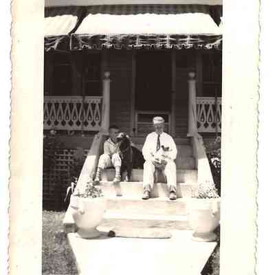 Harold "Skip " M. Welsh, Martin D. Welsh, Sr., and dogs at home on their porch in Bakerton, c. 1938: IMG2025.026.001 (27)