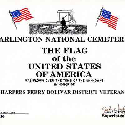 Framed certificate with a U. S. flag flown at the Tomb of the Unknowns