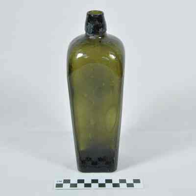 Dark green glass camphor bottle