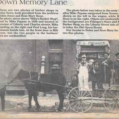 Horse and wagon in front of Ennis' Barber Shop and Fidinger's Store, 1920s (IMG3908017)