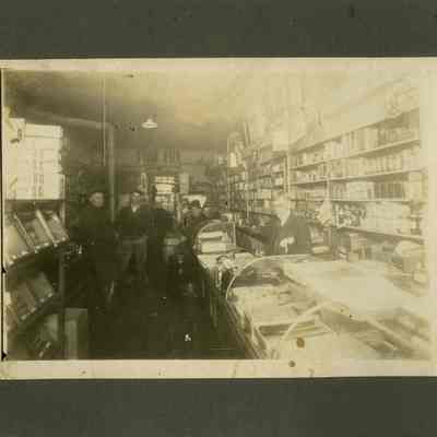Cecil Eby, Sr. in his store on Washington Street