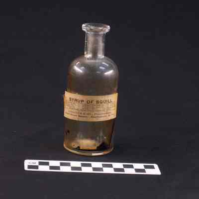 Pharmacy bottle with paper label "SYRUP OF SQUILL"