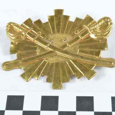Stamped brass Sheridan Cavalry Corps hat badge