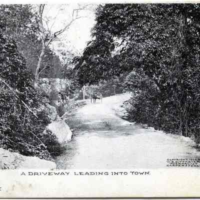 A Driveway Leading into Town