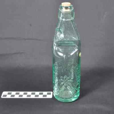 Light green glass beverage bottle