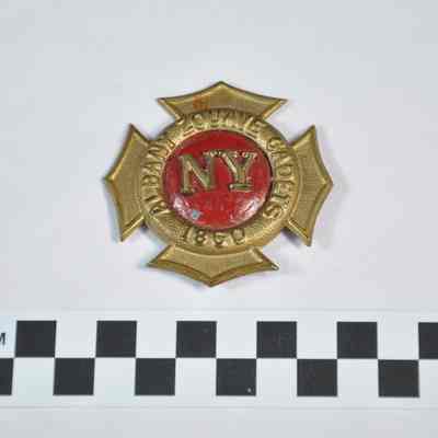 Hat badge shaped like fireman's badge