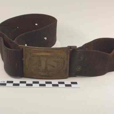 Wide leather belt with brass buckle and keeper