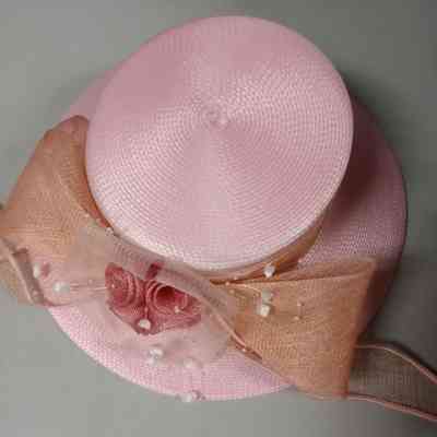 Light pink straw church hat with pink ribbon