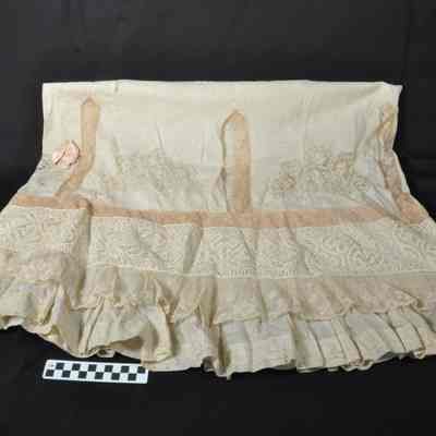 Long petticoat, probably cotton with lace panels