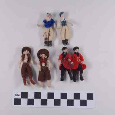 Six small handmade cloth dolls